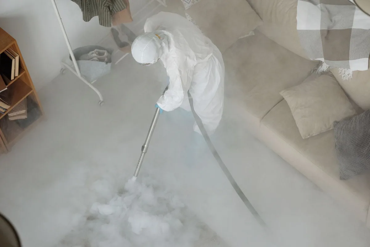 Biohazard cleanup technician in protective equipment, Vermilion, OH